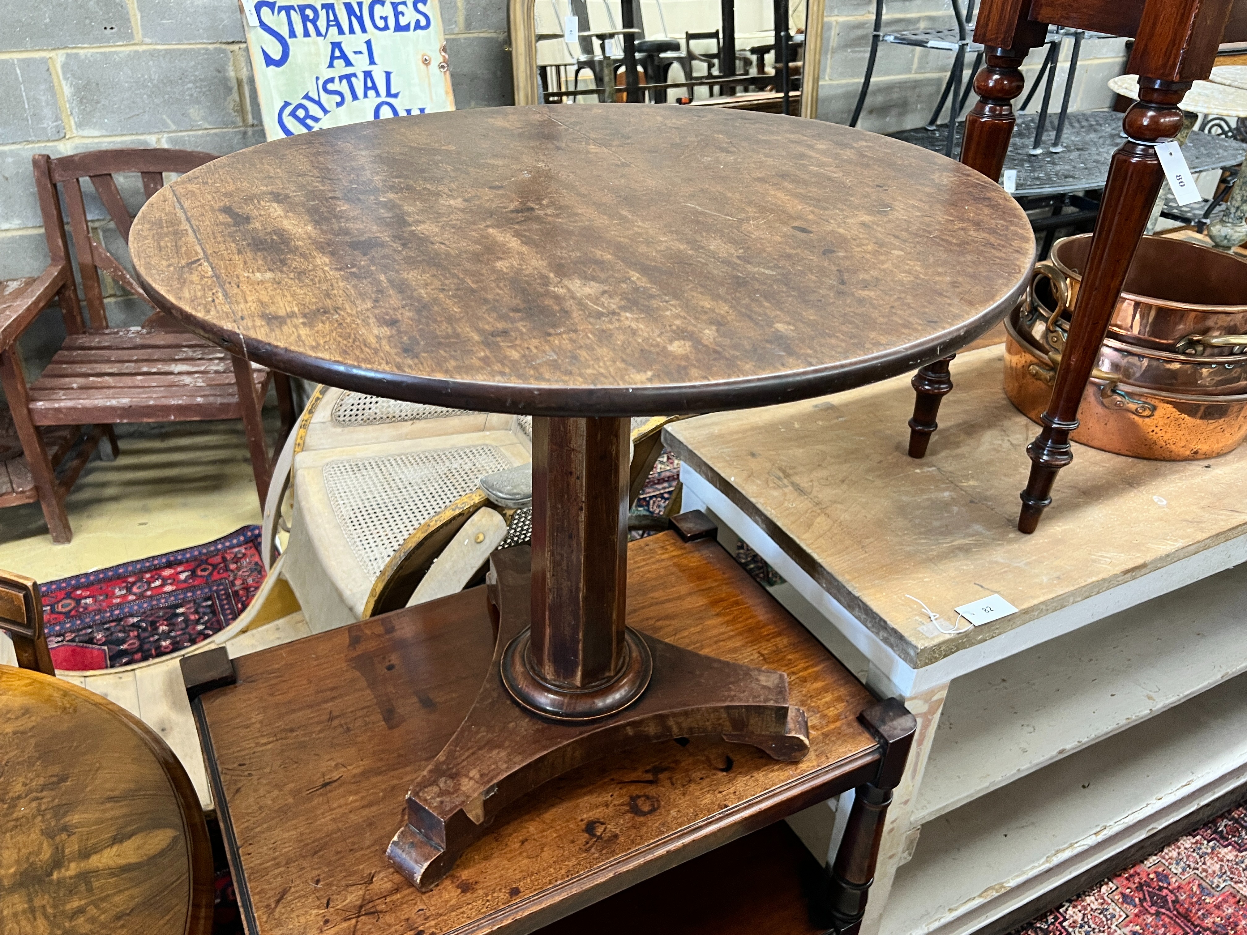 A Victorian mahogany two tier table (cut down buffet), width 76cm, depth 50cm, height 77cm together with a mid Victorian oval mahogany tea table